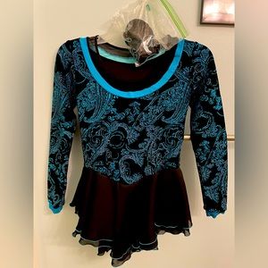Long sleeve competition figure skating dress with matching hair scrunchie